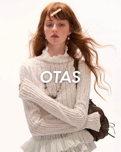 タートルネックルーズトップス