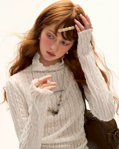 タートルネックルーズトップス